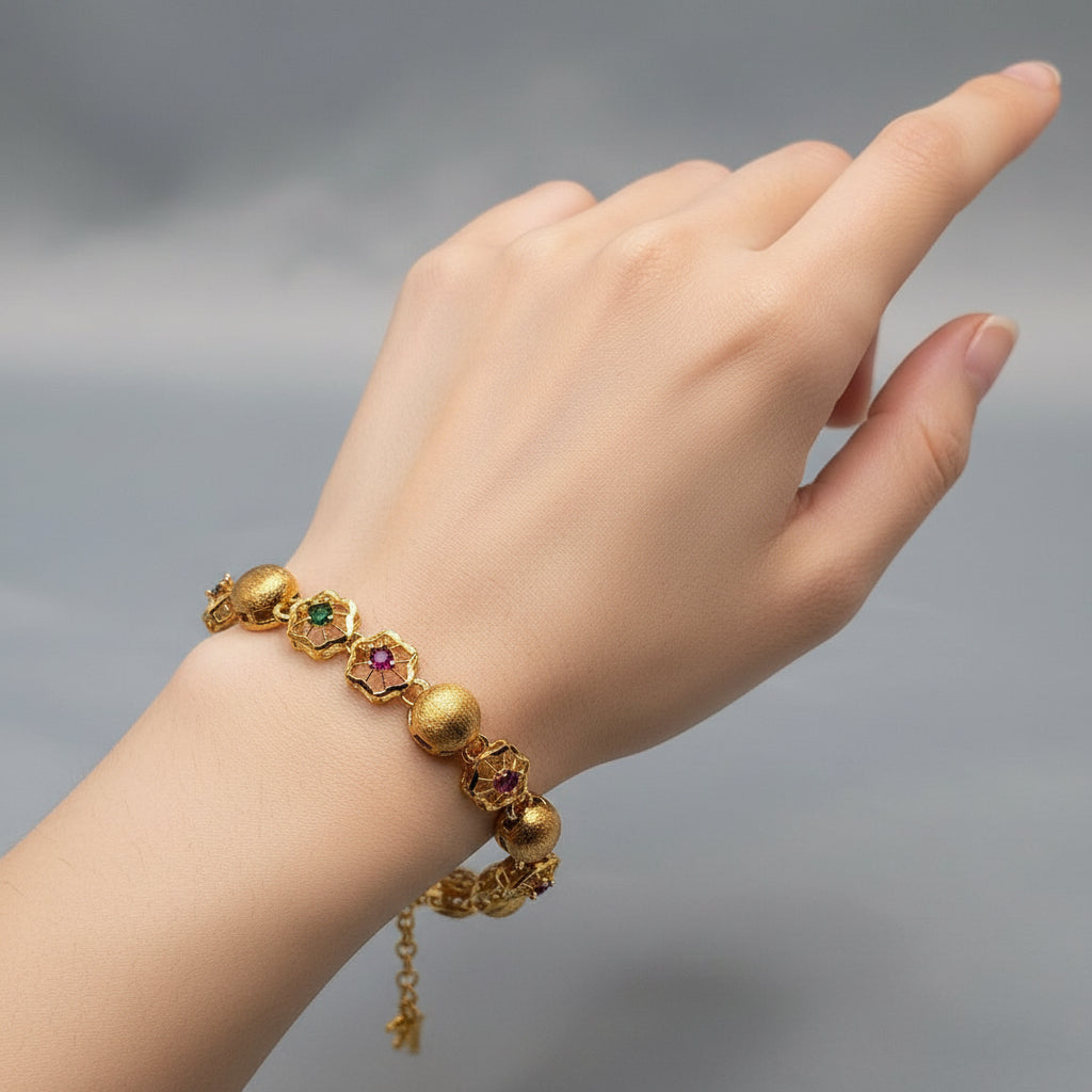 Bracelet with Gold Polish & Pink–Green Stones