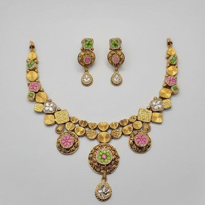 Golden jewellery set with Pink and Green Stones