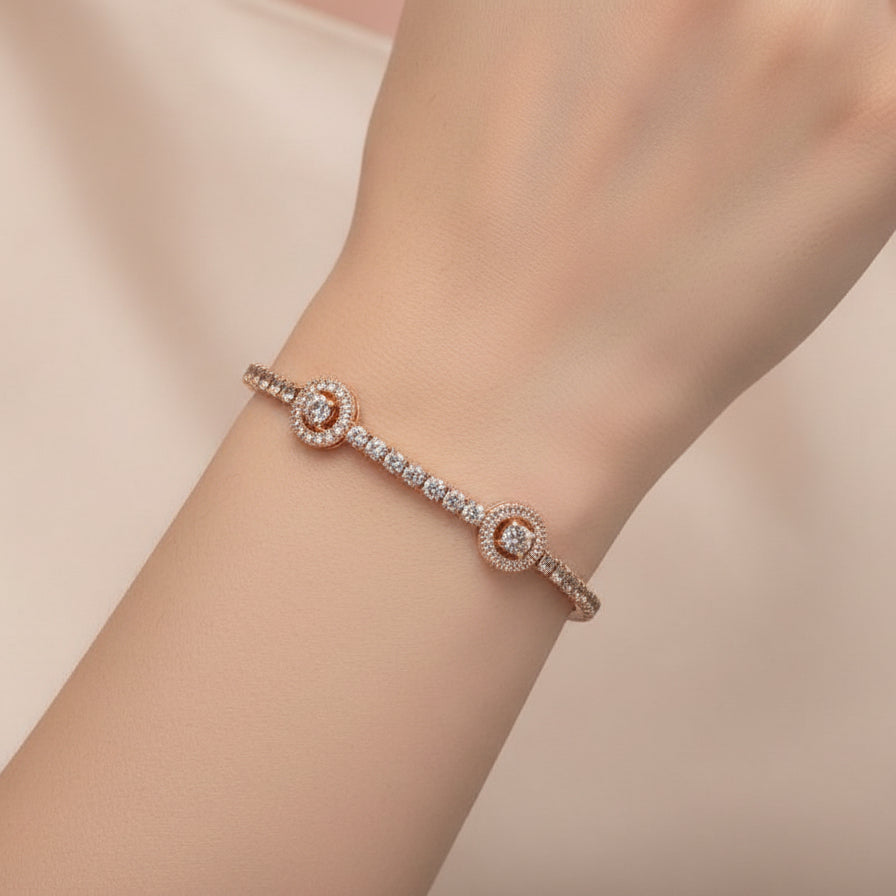 Silver bracelet with clear stones on a gray background