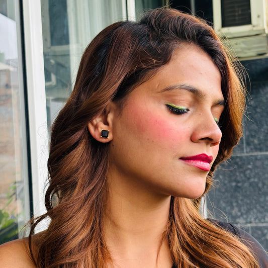 Small black square studs￼