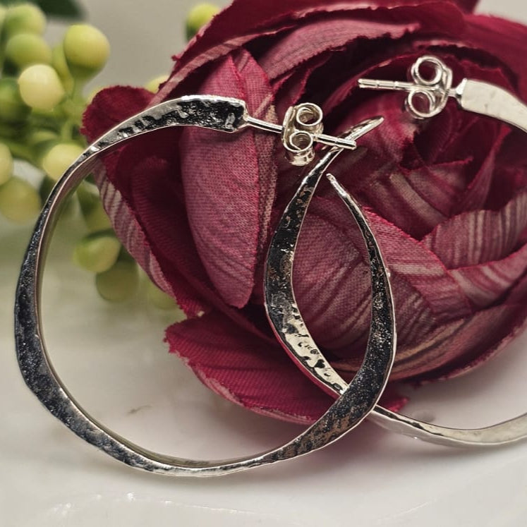 Shining silver hoops