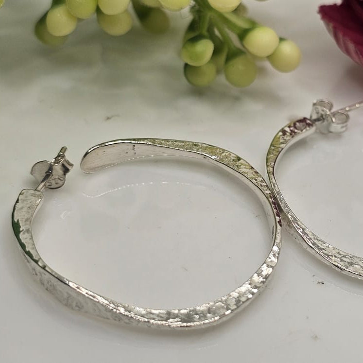 Shining silver hoops