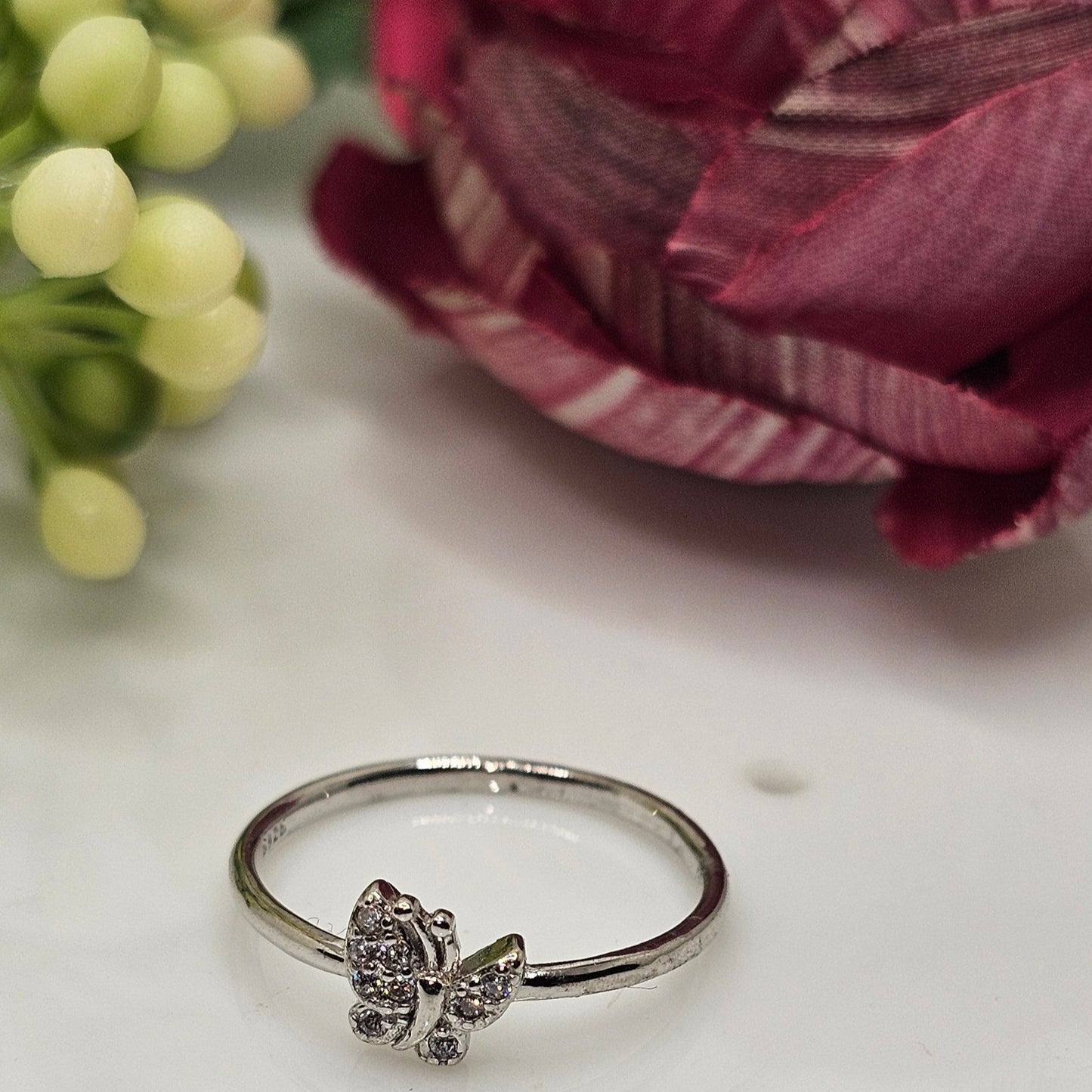 Butterfly ring asymmetrical