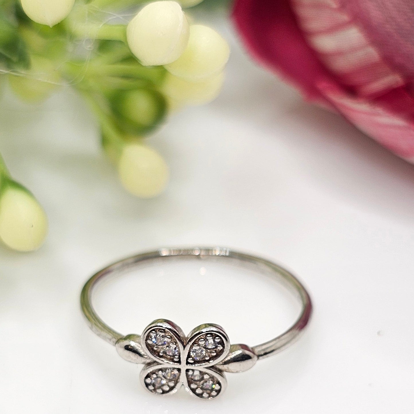 Four petal ring