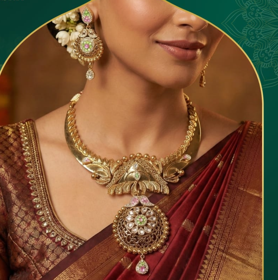 Woman wearing gold jewelry set with 'Vivaah Collection' text on a green background