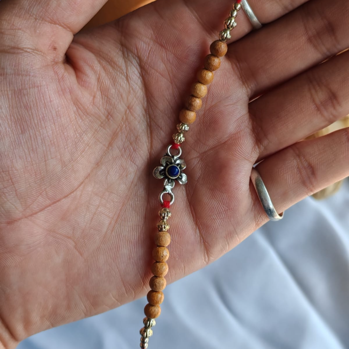 Silver sandalwood Rakhi