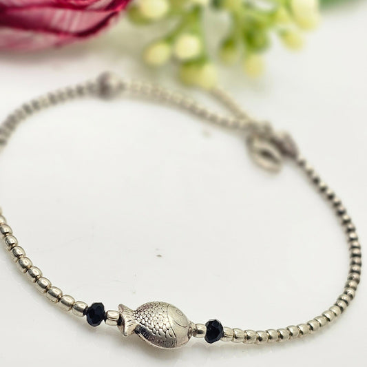 Silver bead anklet with fish charm