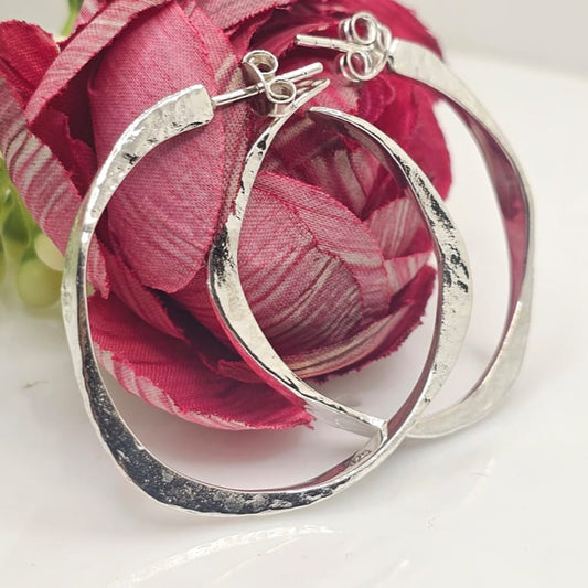 Shining silver hoops