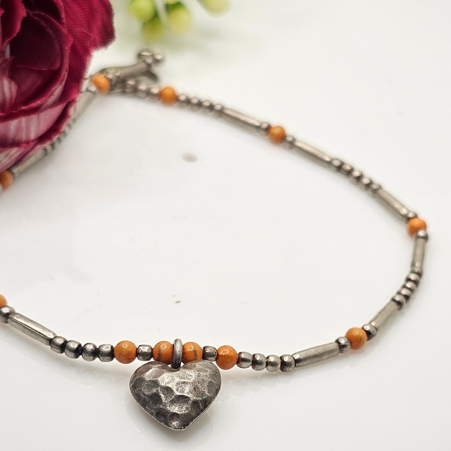 silver and yelow bead anklet with heart charm